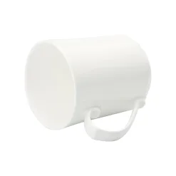 The mug features an elegant ivory white color that is typical of bone china.
